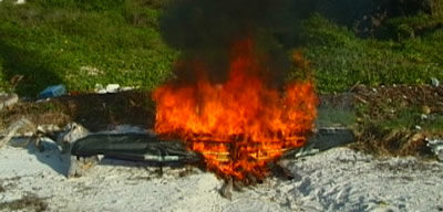 kayak_burning.jpg